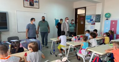 Turkish education authorities visit a classroom in northwestern Bilecik province for inspection of COVID-19 precautions on Sept. 4, 2021. (IHA Photo)