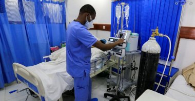 A health care worker attends to a patient with coronavirus inside the Intensive Care Unit (ICU) ward at the Care Hospital, Nairobi, Kenya, Aug. 4, 2021. (Reuters Photo)