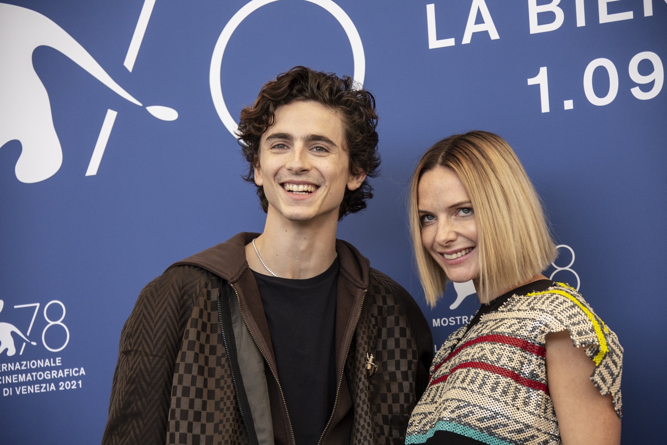 Timothee Chalamet (L), and Rebecca Ferguson pose for photographers at the photocell for the film “Dune” at the 78th Venice Film Festival, in Venice, Italy, Sept. 3, 2021. (AP Photo)