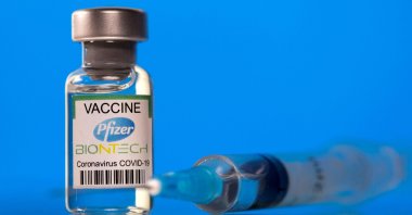 A vial labeled as the Pfizer-BioNTech coronavirus vaccine is seen in this illustration picture taken March 19, 2021. (Reuters Photo)