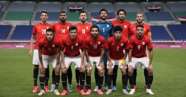 Egypt players pose for a team photo prior to the Tokyo 2020 men's quarterfinal against Brazil, Saitama, Japan, July 31, 2021. (AP Photo)