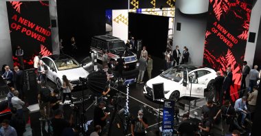 Fairgoers inspect Mercedes cars during a press preview at the International Motor Show (IAA), in Munich, southern Germany, Sept. 6, 2021. (AFP Photo)
