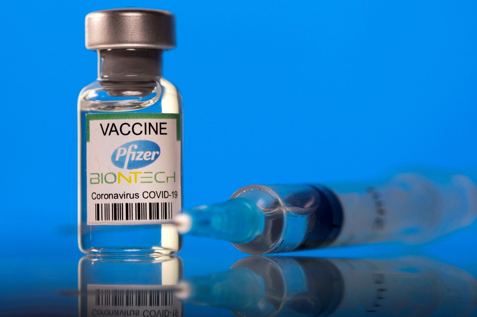 A vial labeled as the Pfizer-BioNTech coronavirus vaccine is seen in this illustration picture taken March 19, 2021. (Reuters Photo)