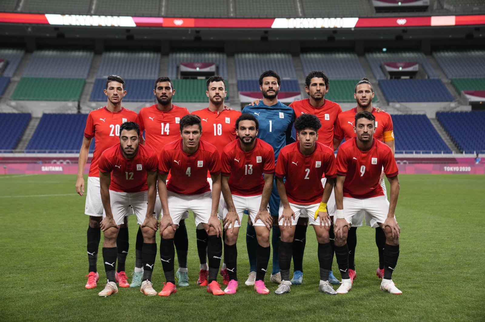 Egypt players pose for a team photo prior to the Tokyo 2020 men's quarterfinal against Brazil, Saitama, Japan, July 31, 2021. (AP Photo)