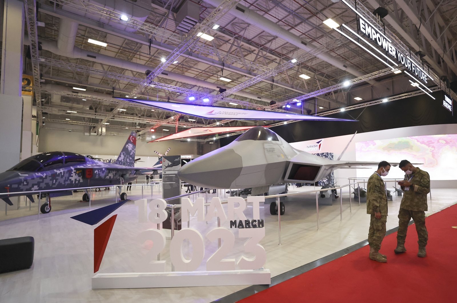 Life-size mockups of TAI's Hürjet and MMU are on display at the IDEF, Istanbul, Turkey, Aug. 18, 2021. (AA Photo)