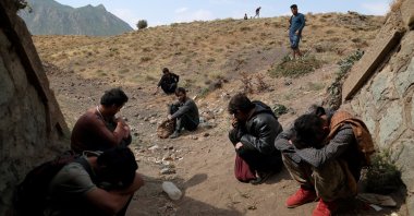 Afghan migrants hide from security forces after crossing illegally into Turkey from Iran, near Tatvan in Bitlis province, Turkey Aug. 23, 2021. (Reuters File Photo)