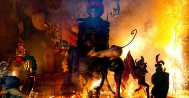 Ninots (cardboard figurines) burn as one installation of the Fallas Festival is set on fire in Valencia, Spain, Sept. 5, 2021. (AFP Photo)