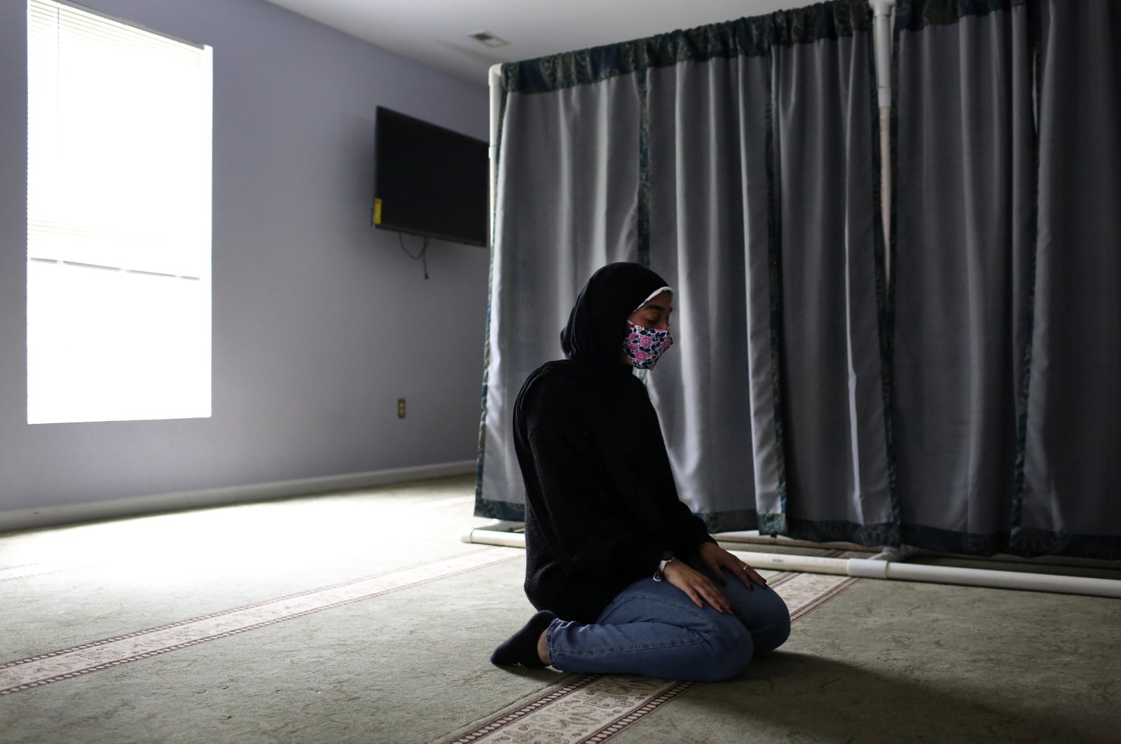 Amirah Ahmed prays at her local mosque in Fredericksburg, Virginia, U.S., Aug. 15, 2021. (AP Photo)
