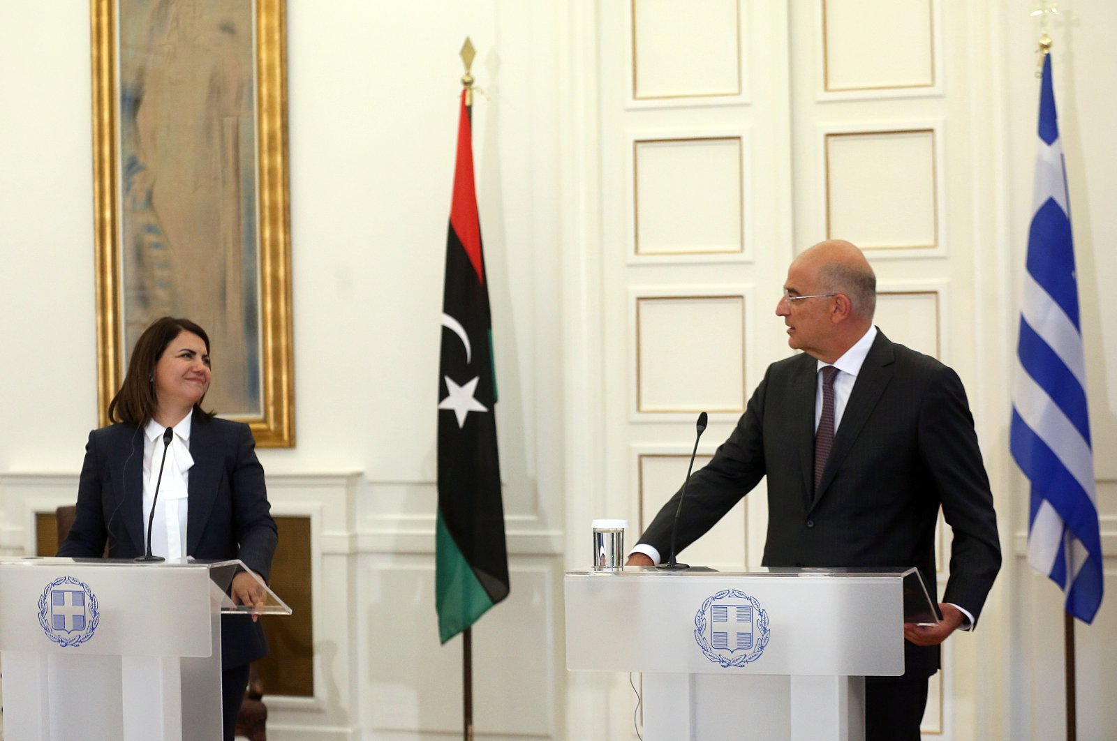 Greek Foreign Minister Nikos Dendias (R) and Libyan Foreign Minister Najla El Mangoush (L), make statements after their meeting in Athens, Greece, Sept. 6, 2021. (EPA Photo)