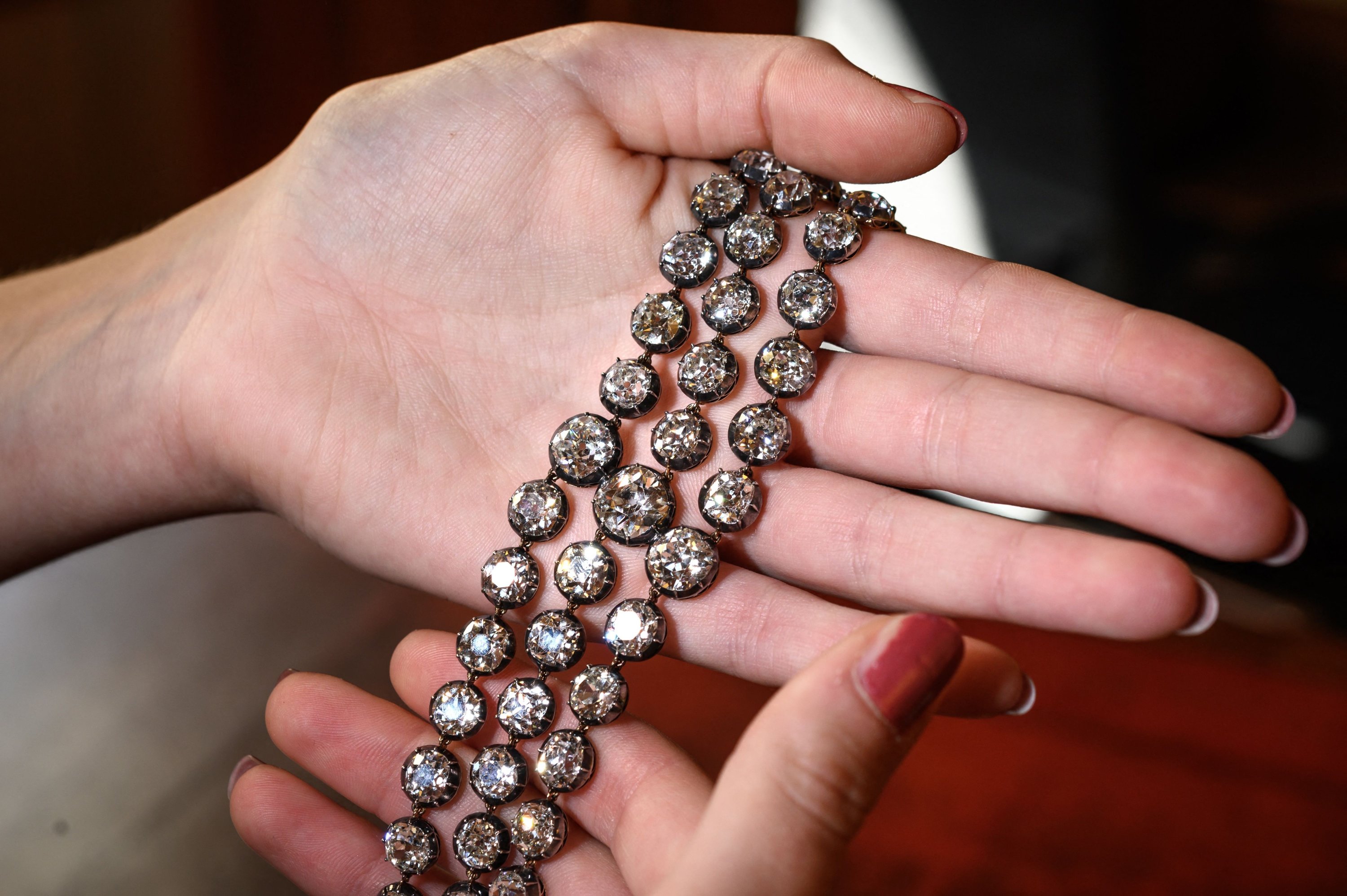 This picture taken in Geneva on Sep. 6, 2021 shows two bracelets belonged to French Queen Marie-Antoinette adorned with three rows of 112 old cut diamonds. (AFP Photo)