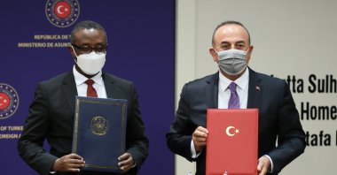 Foreign Minister Mevlüt Çavuşoğlu poses after signing agreements with his Rwandan counterpart Vincent Biruta in Ankara, Turkey, Sept. 7, 2021. (AA Photo)