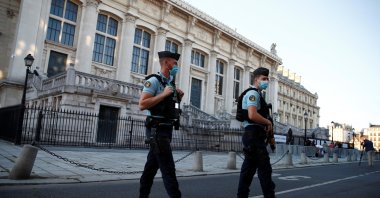 French police forces are seen near the Paris courthouse on the Ile de la Cite before the start of the trial of Paris' November 2015 attacks, in Paris, France, Sept. 8, 2021. (Reuters Photo)