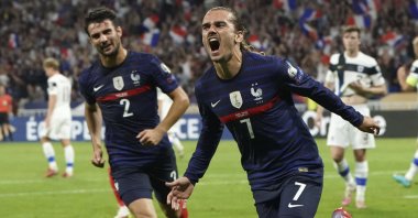 France's Antoine Griezmann celebrates after scoring against Finland in a World Cup 2022 Group D qualifier in Lyon, France, Sept. 7, 2021. (AP Photo)