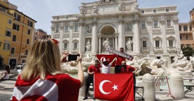 Turkish fans pose in front of Trevi fountain ahead of a national football match between Italy and Turkey, in Rome, Italy, June 11, 2021. (AA PHOTO) 