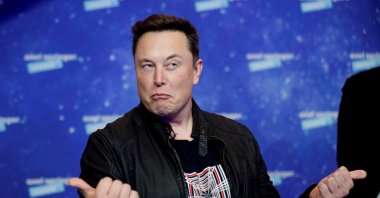 SpaceX owner and Tesla CEO Elon Musk grimaces after arriving on the red carpet for the Axel Springer award, in Berlin, Germany, Dec. 1, 2020. (REUTERS Photo)
