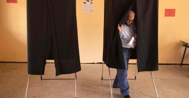 A voter prepares to cast a ballot during Morocco's parliamentary and local elections in the capital Rabat on Sept. 8, 2021. (AFP Photo)