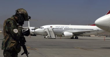 A Taliban soldier stands guard at Kabul Hamid Karzai International Airport in Kabul, Afghanistan, Sept. 5, 2021. (AP Photo)