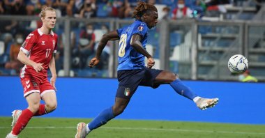Italy's Moise Kean scores his side's fourth goal in a World Cup 2022 European qualifier against Lithuania at Mapei Stadium, Reggio Emilia, Italy, Sept. 8, 2021.