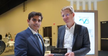 Türksat Satellite Services deputy general manager Selman Demirel (L) and Inmarsat vice chairperson responsible for technology, Mark Dickinson during the signing ceremony, Washington, U.S., Sept. 9, 2021. (AA Photo)