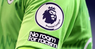 The "No Room For Racism" logo on Everton goalkeeper Jordan Pickford's shirt during a Premier League match against Tottenham Hotspur, London, England, Sept. 13, 2020. (AP Photo)