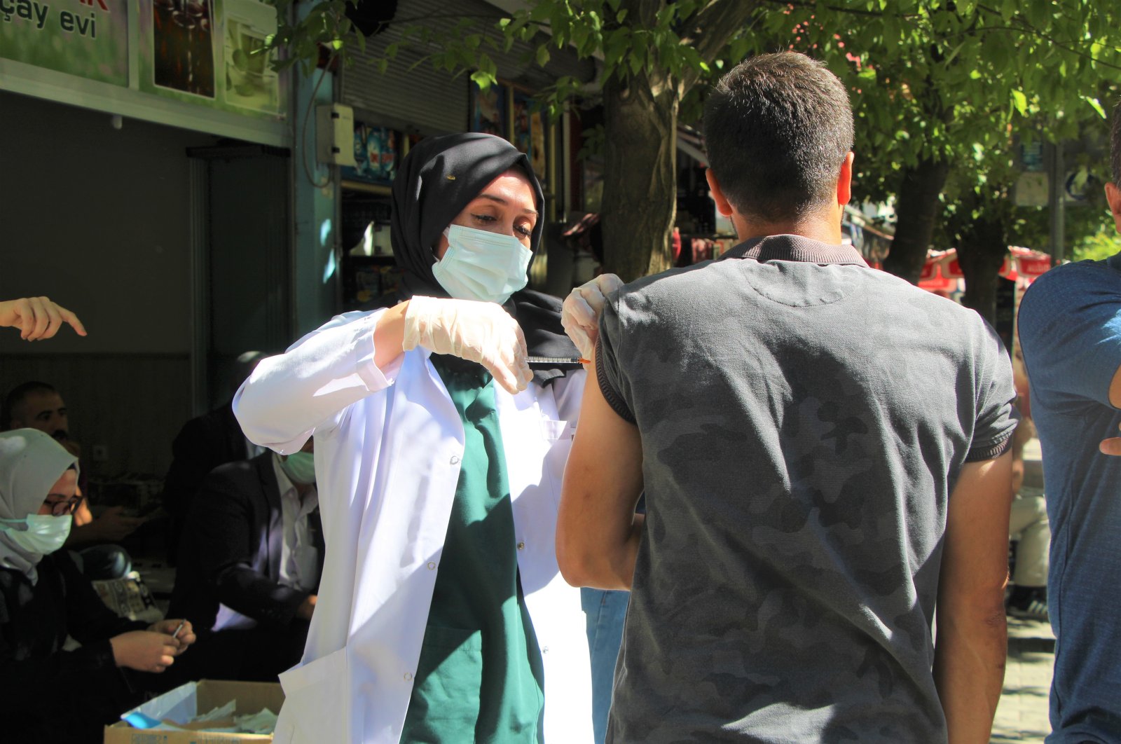 A man gets vaccinated at a vaccination point on a street in Bingöl, eastern Turkey, Sept. 8, 2021. (İHA PHOTO)