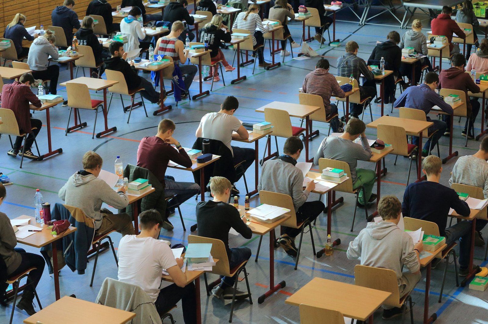High school students sit at their tables during the final school leaving exams (Abitur) at the ecumenical Domgymnasium (high school) in Magdeburg, Germany, April 29, 2015. Getty Images)