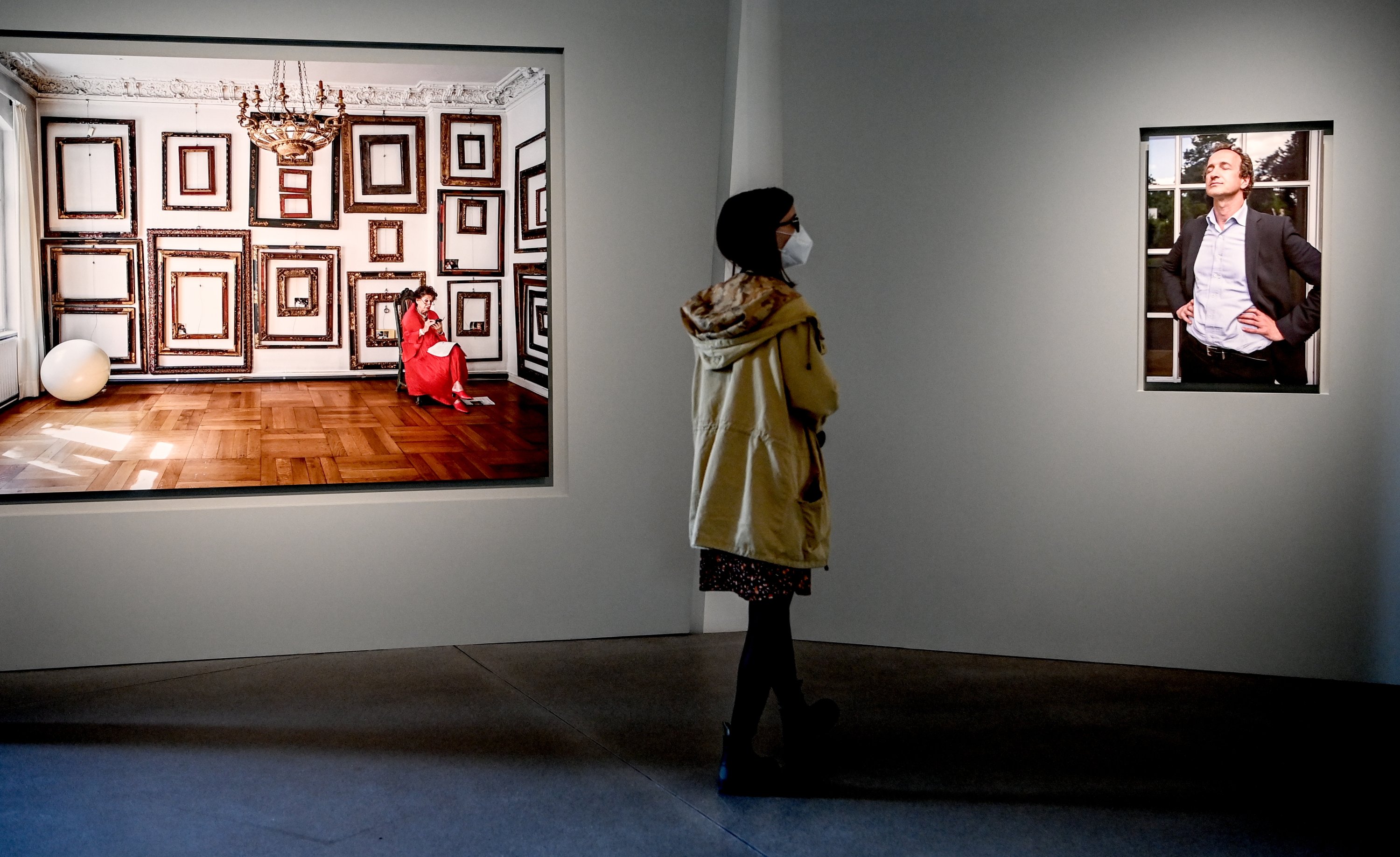 A visitor examines portraits by Frederic Brenner in the Jewish Museum Berlin. (dpa Photo)