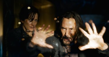 Carrie-Anne Moss returns as Trinity and Keanu Reeves as Neo in the "The Matrix Resurrections" arriving 20 years after "The Matrix" trilogy concluded. (dpa Photo)