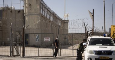 Israeli prison guards work as the group Choosing Life, that includes relatives of Israelis killed in Palestinian attacks, protest outside of Ofer Prison near Jerusalem, Thursday, Sept. 9, 2021. (AP File Photo)