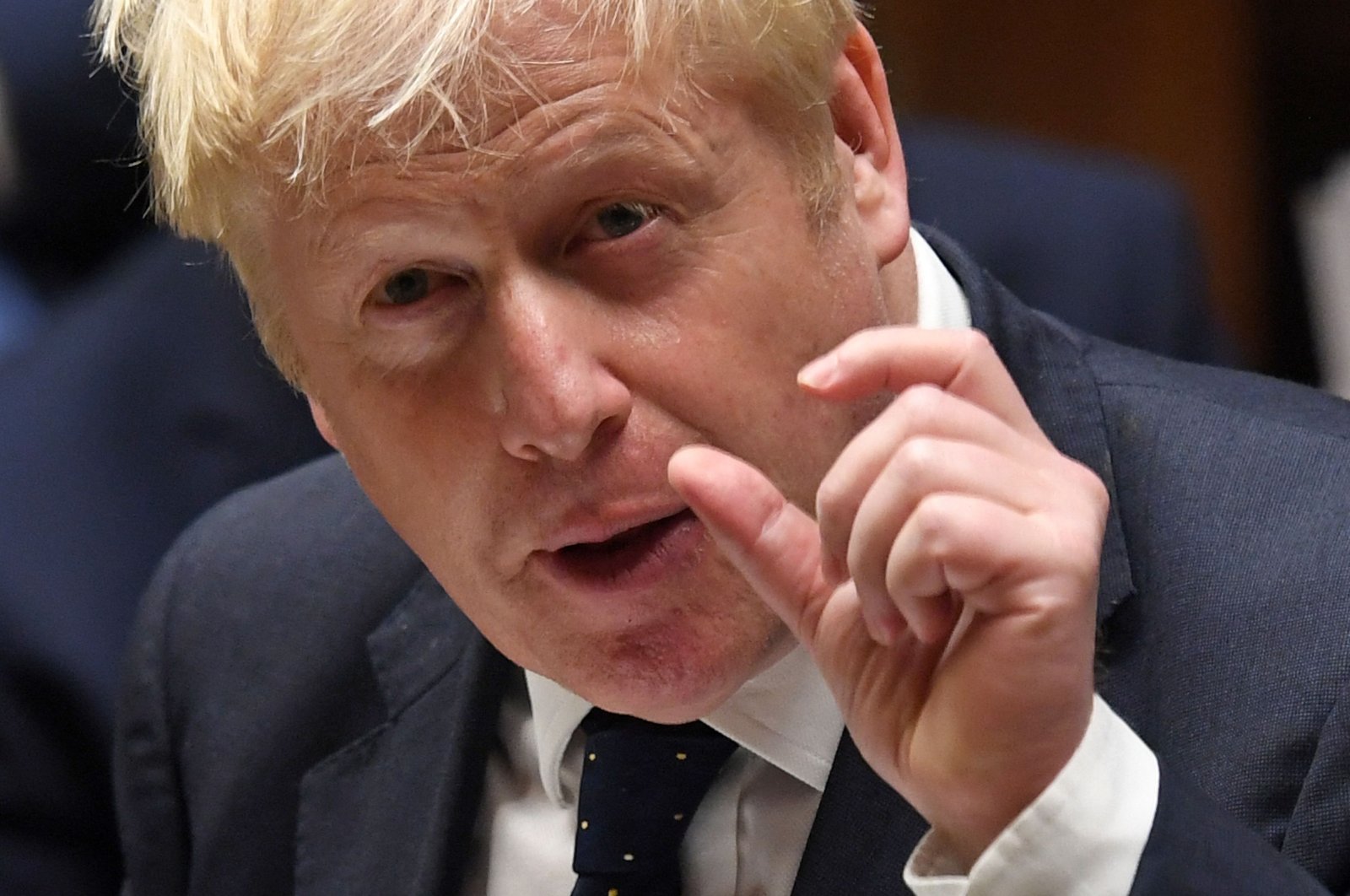 A handout photograph released by the U.K. Parliament shows Britain's Prime Minister Boris Johnson making a statement on health and social care in the House of Commons in London, U.K., Sept. 7, 2021.(Photo by Jessica Taylor/U.K. Parliament via AFP)