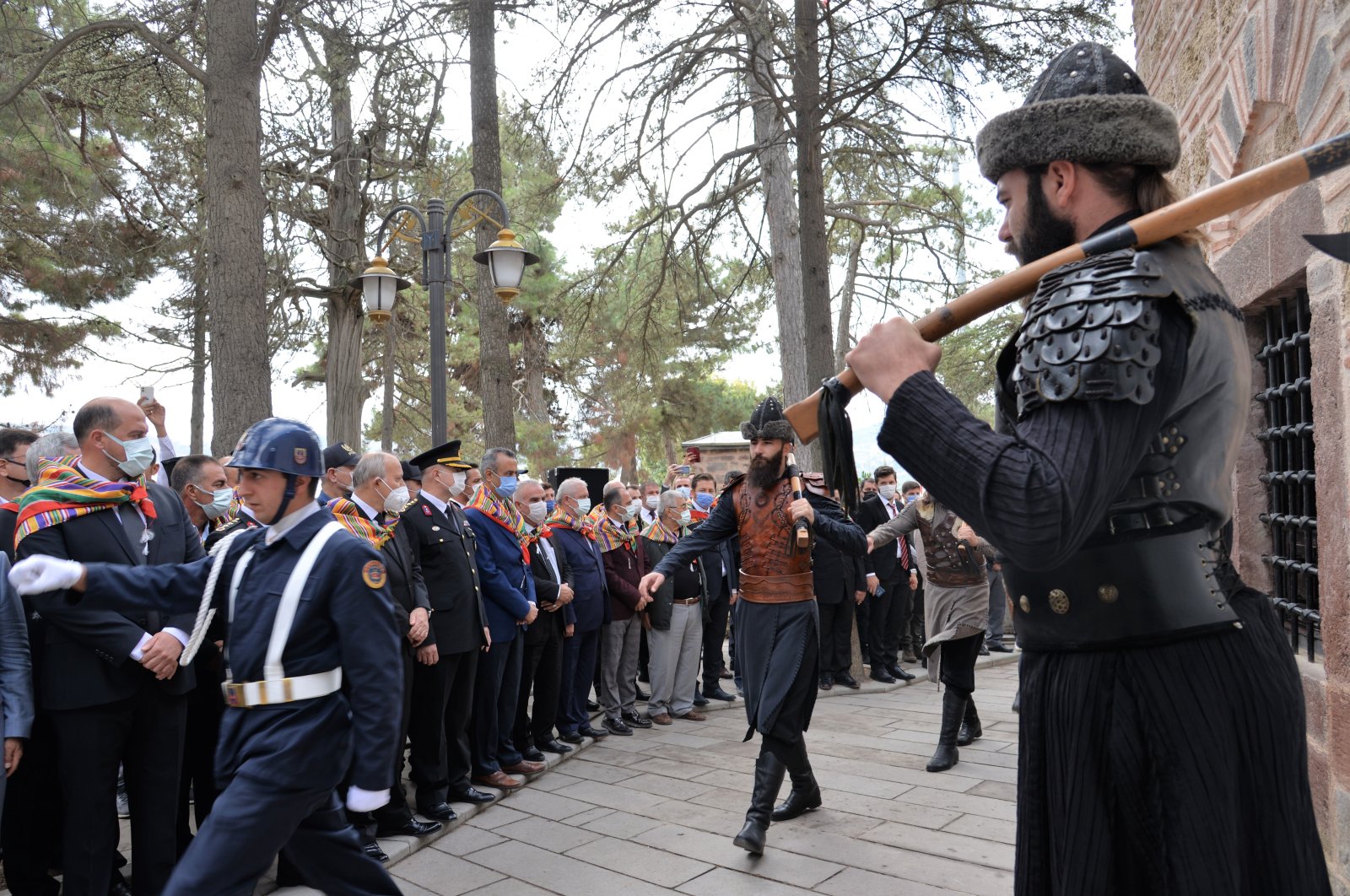 Soldiers in modern and ancient uniforms parade in front of Ertuğrul Ghazi's tomb, in Bilecik, western Turkey, Sept. 10, 2021. (AA PHOTO) 