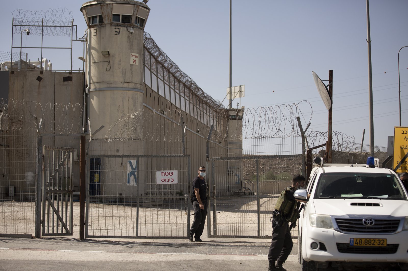 Israeli prison guards work as the group Choosing Life, that includes relatives of Israelis killed in Palestinian attacks, protest outside of Ofer Prison near Jerusalem, Thursday, Sept. 9, 2021. (AP File Photo)