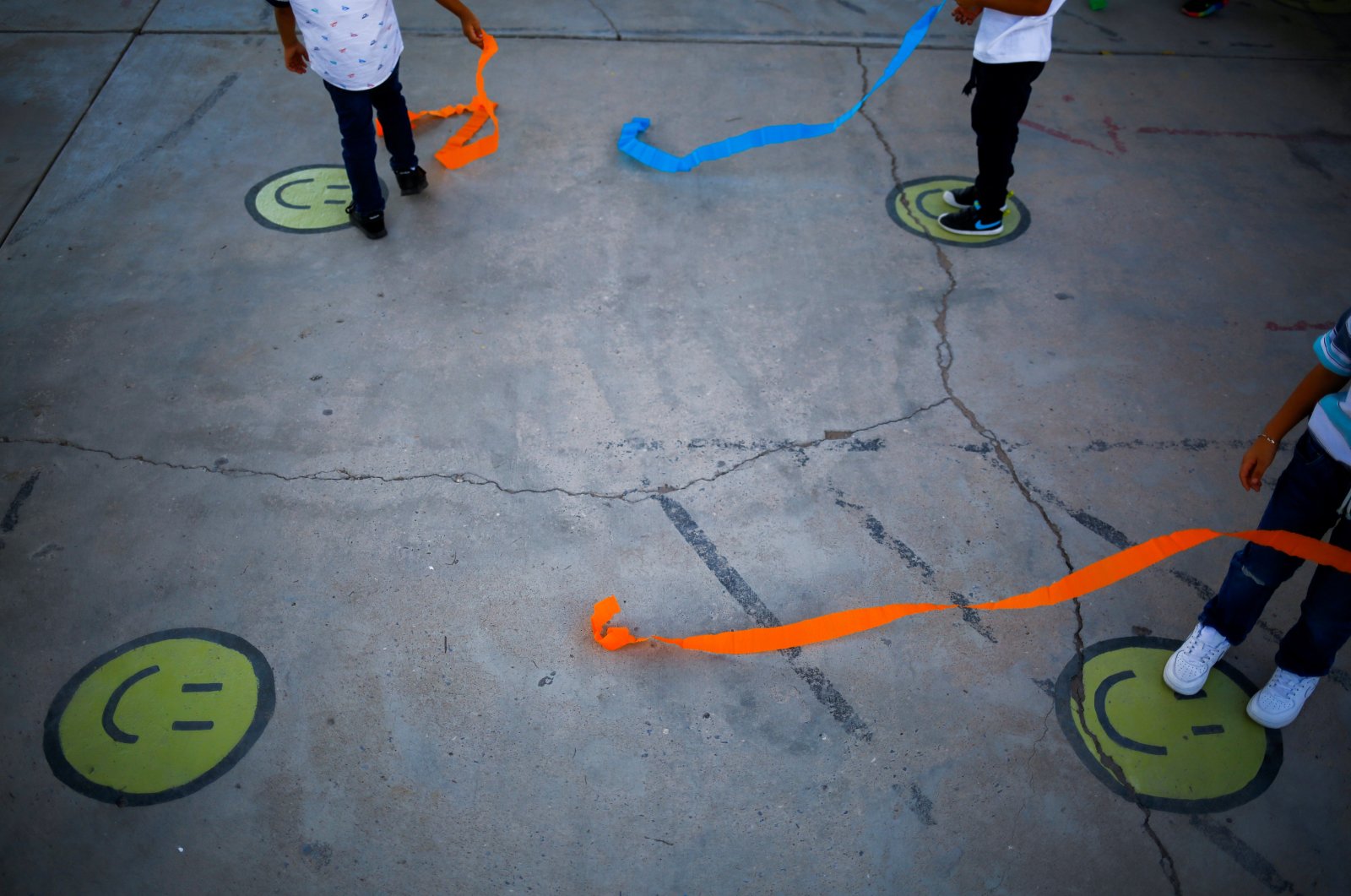 Smile emoticons are seen on the floor of a kindergarten, Ciudad Juarez, Mexico, Aug. 30, 2021. (Reuters Photo)