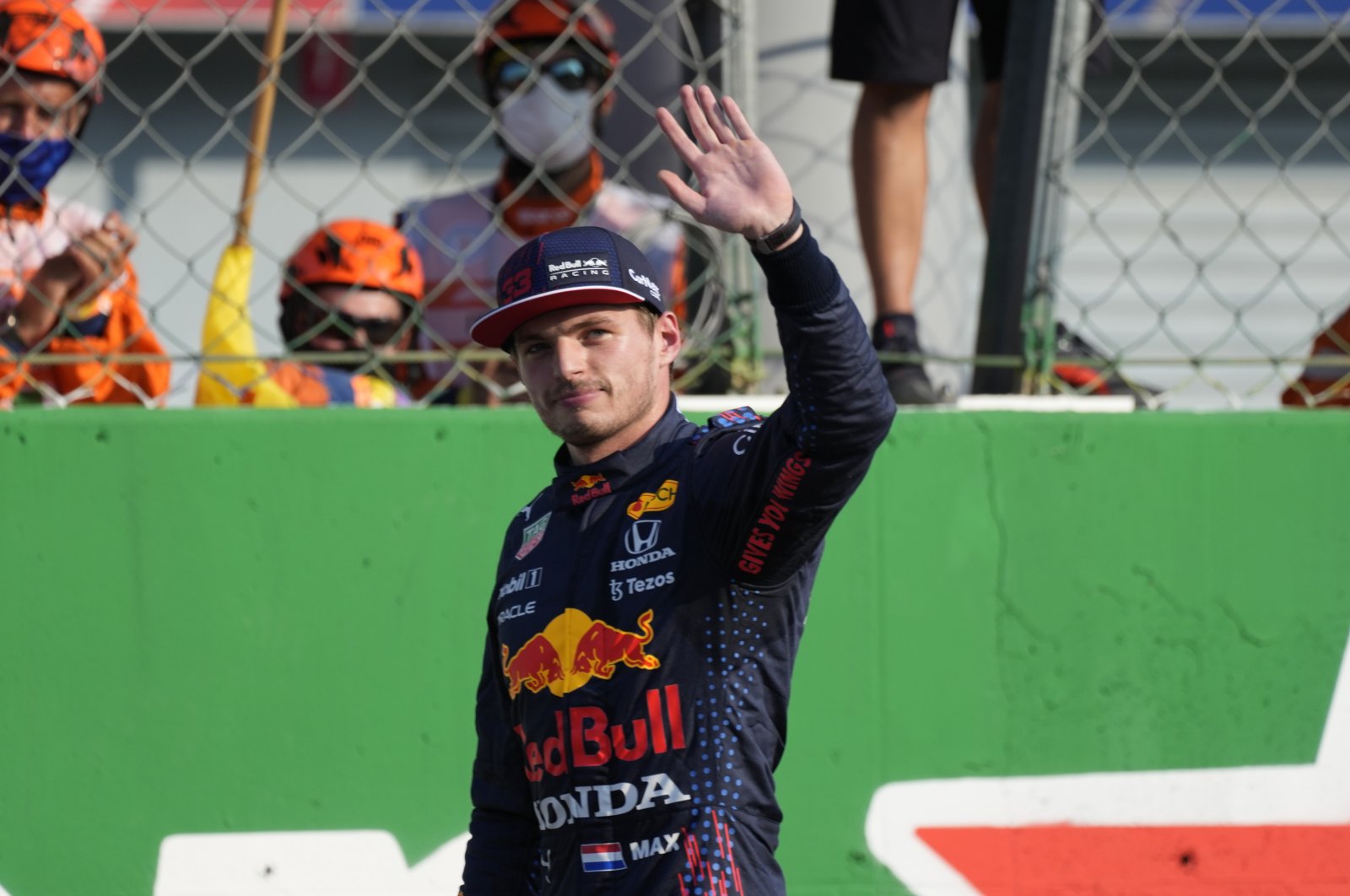 Red Bull driver Max Verstappen of the Netherlands waves to fans after the Sprint Race qualifying session at the Monza racetrack, in Monza, Italy, Sept.11, 2021. (AP Photo)
