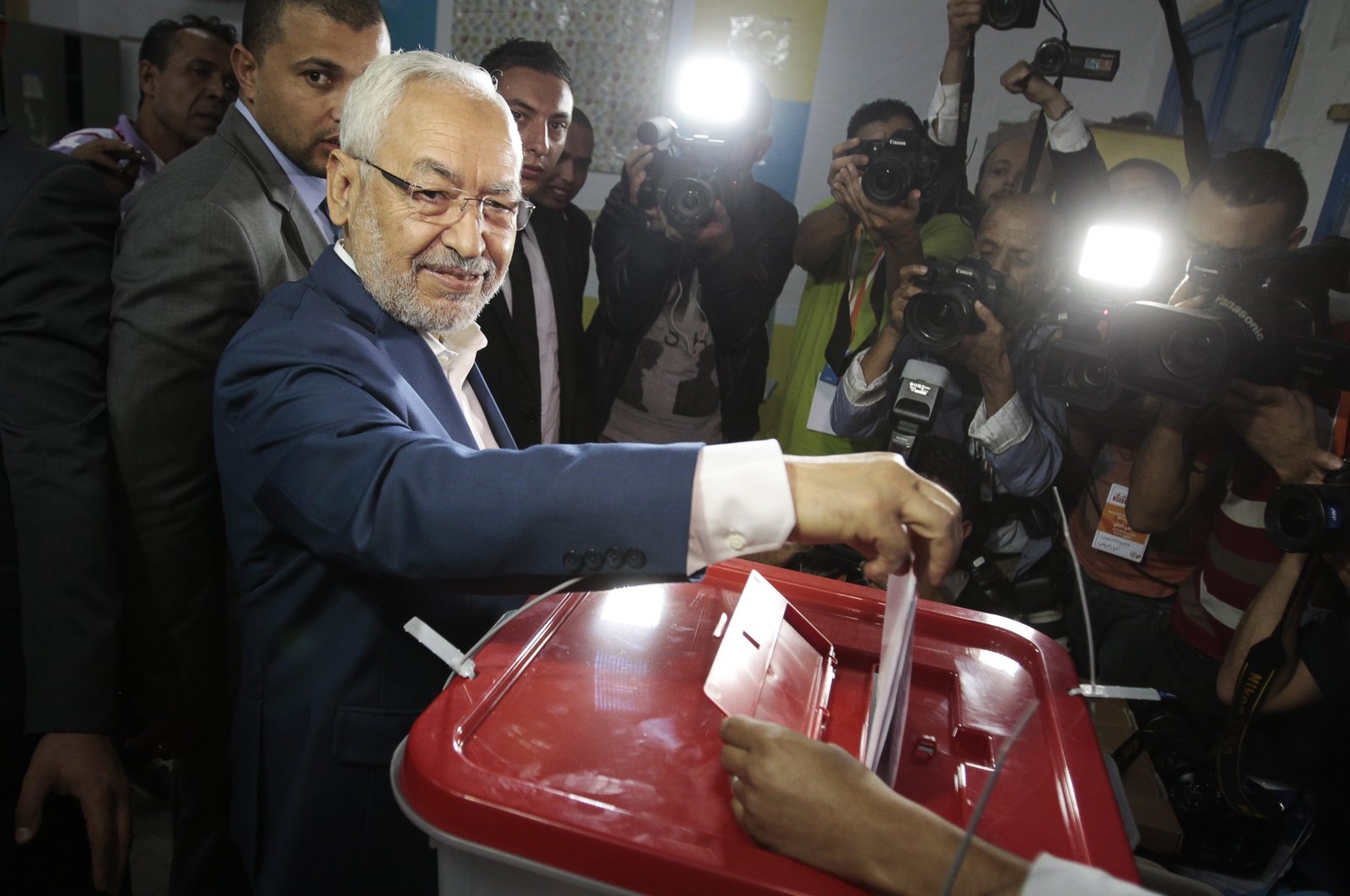 Rached Ghannouchi, leader of Tunisia's Ennahdha party, casts his vote at a polling station in Tunis, Tunisia, Oct. 26, 2014. (Reuters Photo)