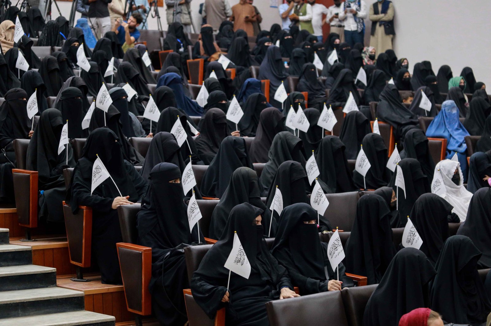 Afghan students listen to female speakers prior to their pro-Taliban rally outside the Shaheed Rabbani Education University in Kabul, Afghanistan, Sept. 11, 2021. (EPA Photo)