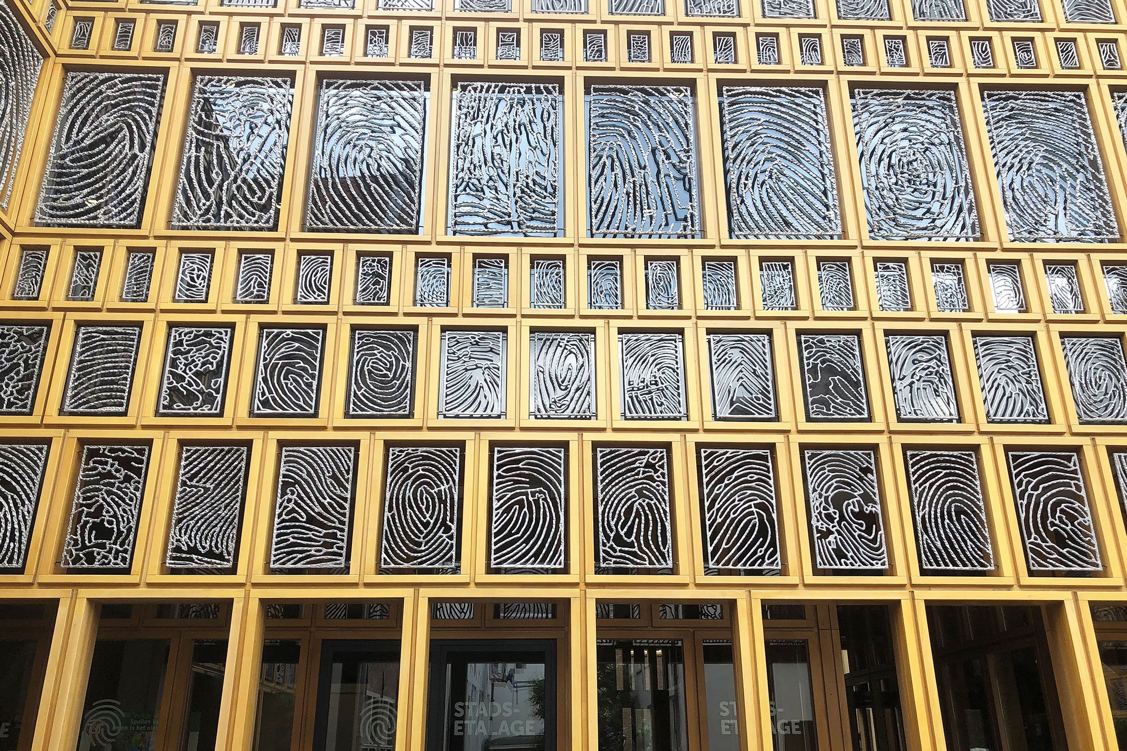 The town hall in the Dutch city of Deventer features a facade with the fingerprints of residents, Deventer, the Netherlands. (dpa Photo)