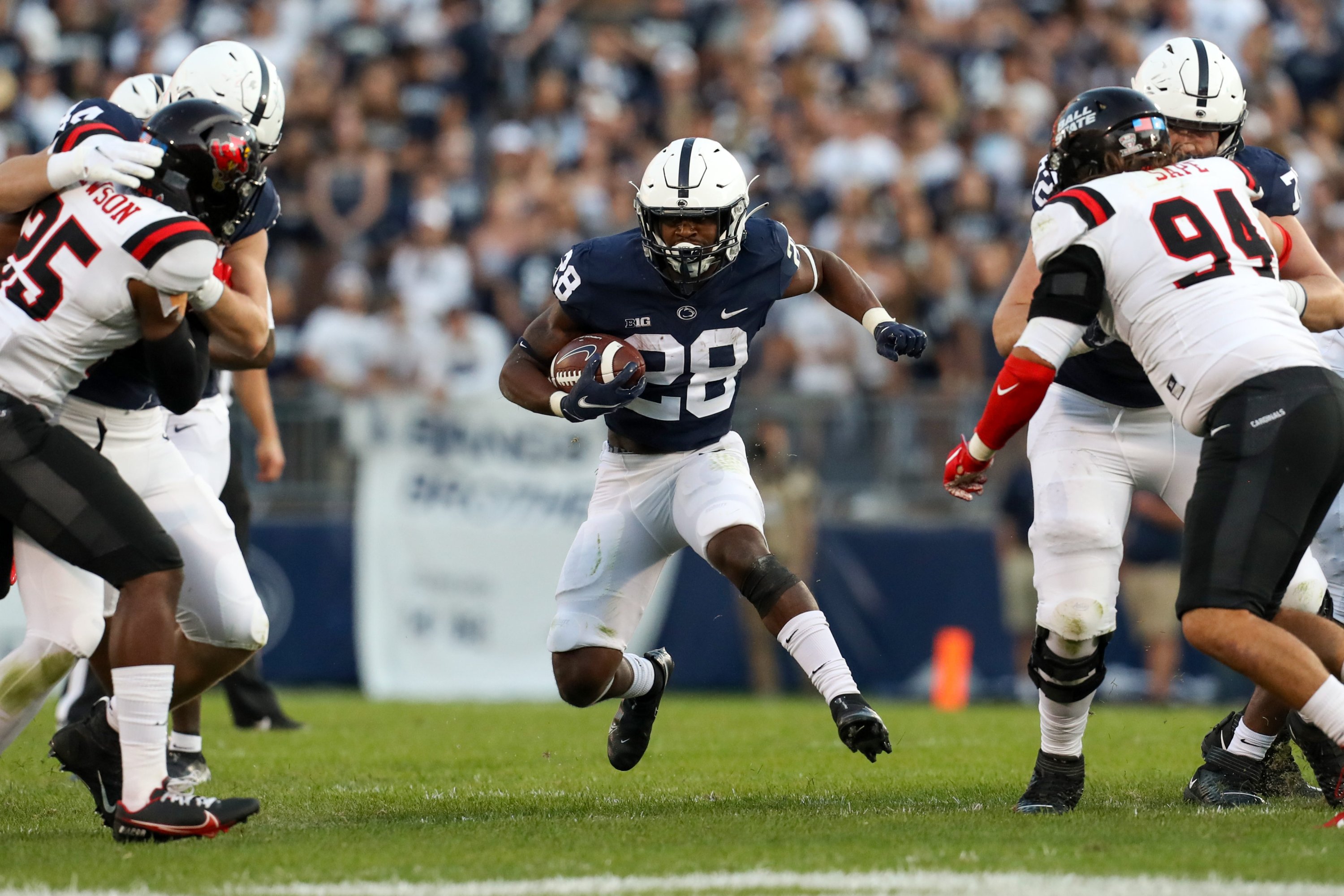 Penn State Nittany Lions running back Devyn Ford (28) runs the ball against the Ball State Cardinals during the fourth quarter at Beaver Stadium, University Park, Pennsylvania, U.S., Sept. 11, 2021. (Matthew OHaren-USA TODAY Sports via Reuters)