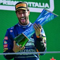 McLaren's Australian driver Daniel Ricciardo celebrates winning the Italian Formula One Grand Prix at the Autodromo Nazionale circuit in Monza, Italy, Sept. 12, 2021. (AFP Photo)