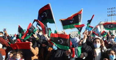 Libyans mark the 10th anniversary of their 2011 uprising that led to the overthrow and killing of longtime ruler Moammar Gadhafi, in Martyrs Square, Tripoli, Libya, Feb. 17, 2021. (AP File Photo)