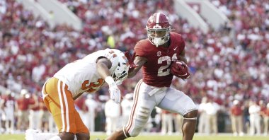 Alabama Crimson Tide running back Jase McClellan (21) pushes away Mercer Bears safety Myles Redding (34) at Bryant-Denny Stadium,Tuscaloosa, Alabama, U.S., Sept. 11, 2021. (Marvin Gentry-USA TODAY Sports via Reuters)