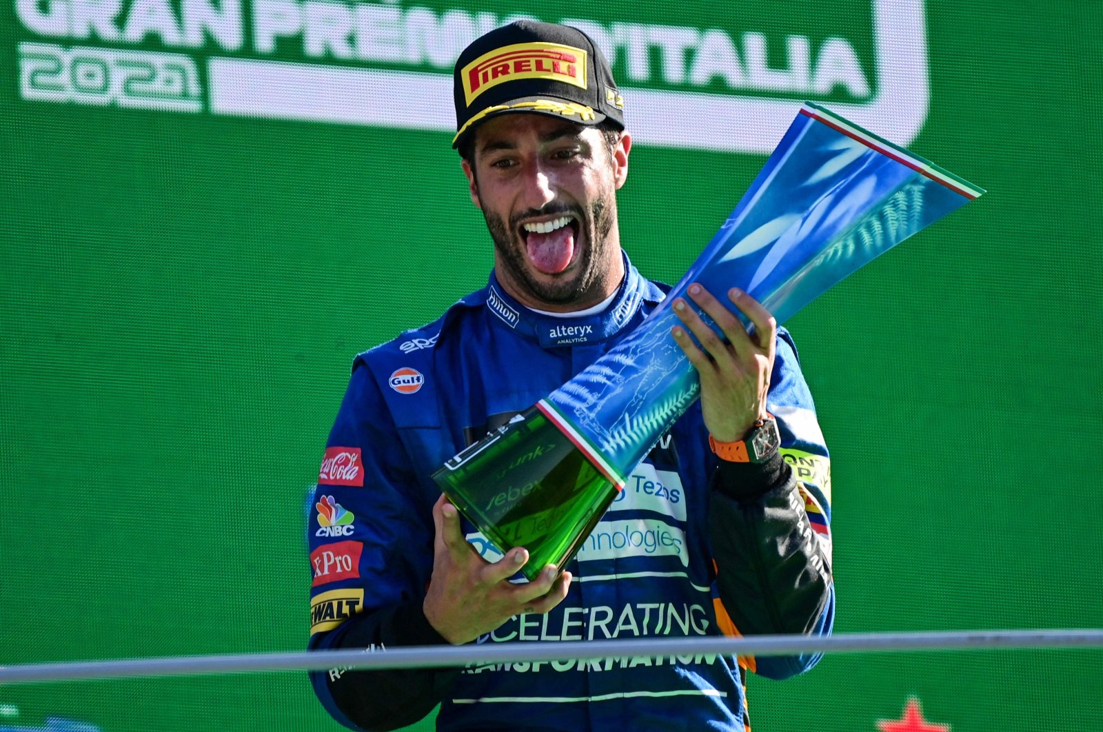 McLaren's Australian driver Daniel Ricciardo celebrates winning the Italian Formula One Grand Prix at the Autodromo Nazionale circuit in Monza, Italy, Sept. 12, 2021. (AFP Photo)
