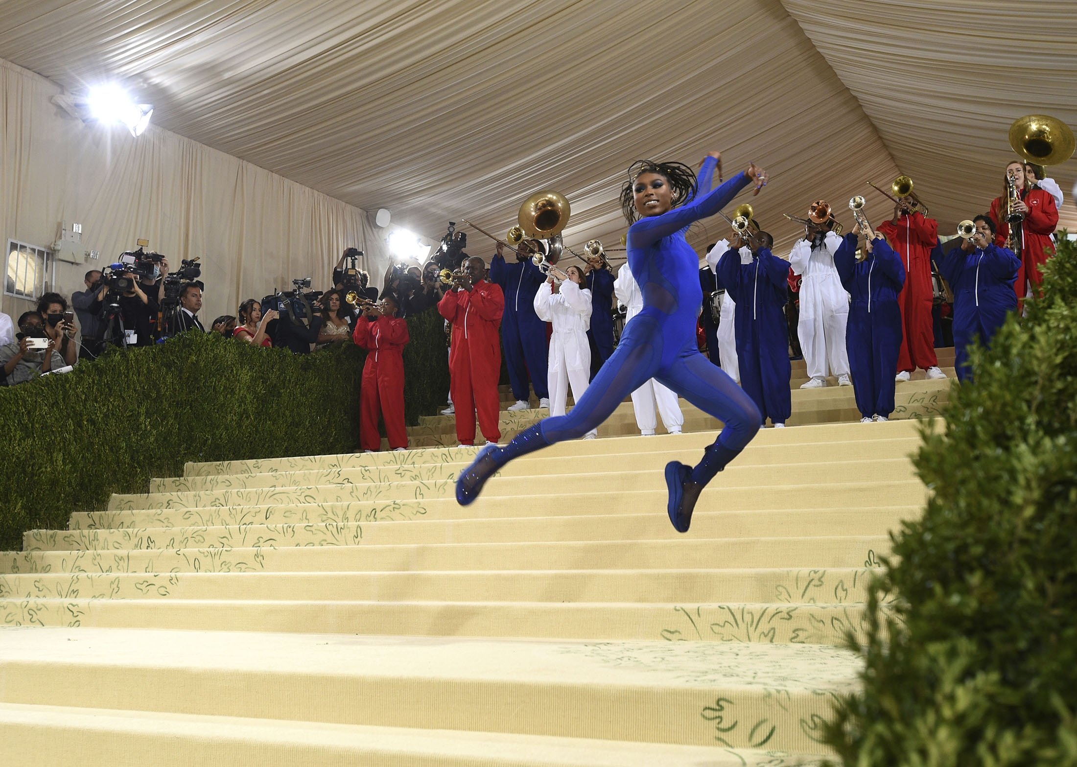 Nia Dennis and the Brooklyn United marching band arrive for the 2021 Met Gala at the Metropolitan Museum of Art, in New York, U.S., Sept. 13, 2021. (AP Photo)