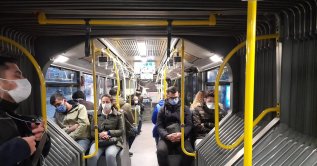 People travel in a largely empty metrobus, in Istanbul, Turkey, Dec. 11, 2020. (PHOTO BY ALİ OKTAY) 