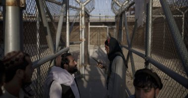 Taliban fighters enter an area where they are holding inmates who have been recently arrested at the Pul-e-Charkhi prison in Kabul, Afghanistan, Sept. 13, 2021. (AP Photo)