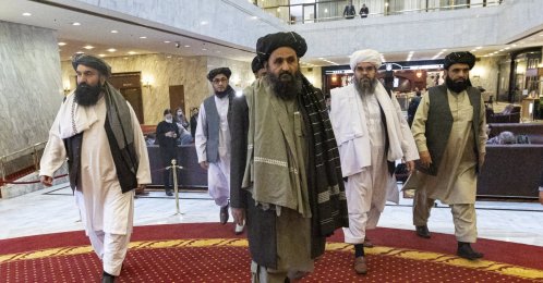 Taliban co-founder Mullah Abdul Ghani Baradar (C) arrives with other members of the Taliban delegation to attend an international peace conference in Moscow, Russia, March 18, 2021. (EPA-EFE Photo)