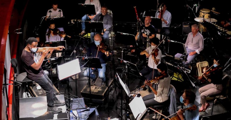 Canadian conductor Kwame Ryan leads a rehearsal of "The Time of Our Singing" opera at the Theatre Royal de la Monnaie in Brussels, Belgium, Sept. 3, 2021. (AFP Photo)