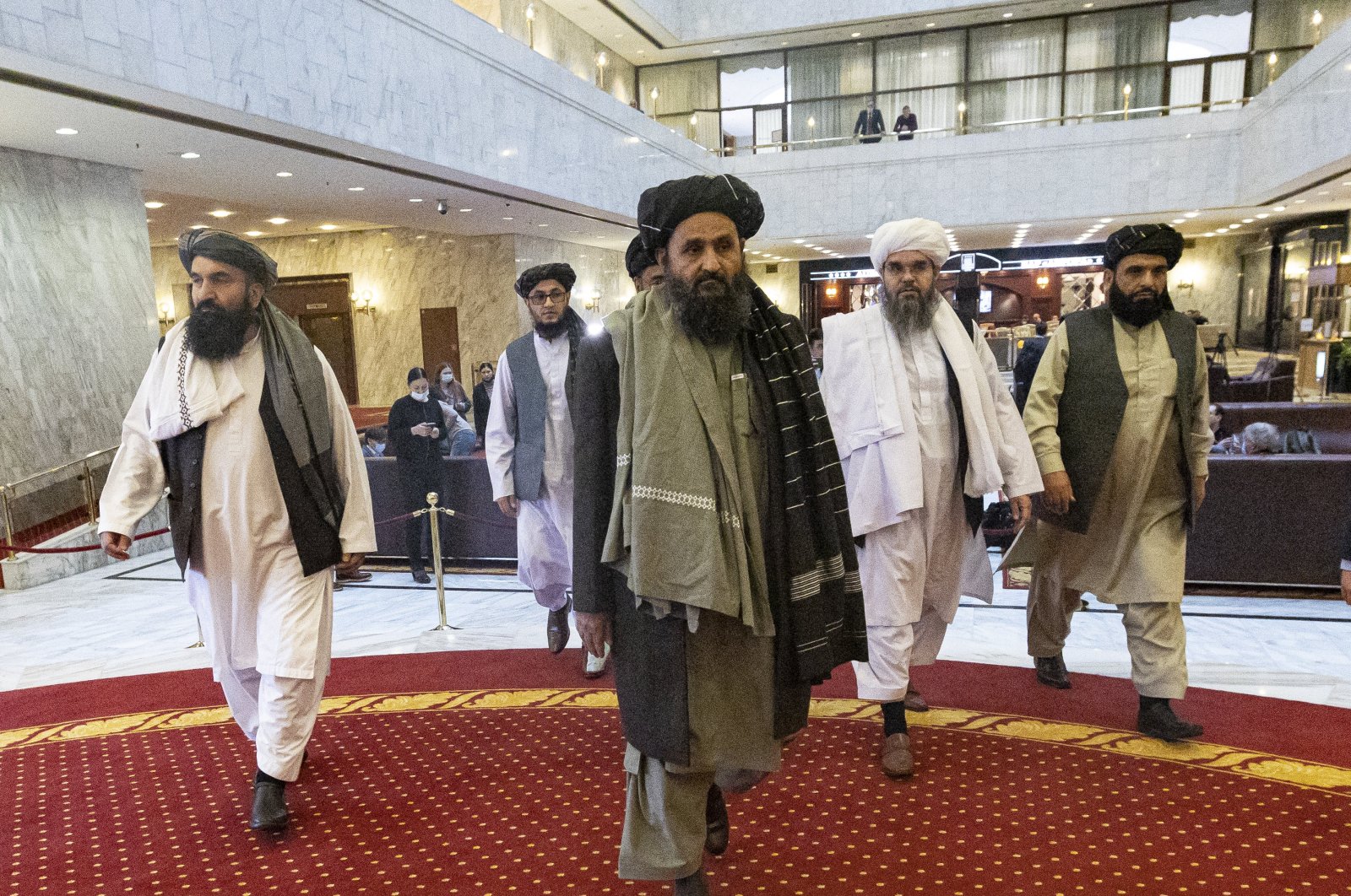 Taliban co-founder Mullah Abdul Ghani Baradar (C) arrives with other members of the Taliban delegation to attend an international peace conference in Moscow, Russia, March 18, 2021. (EPA-EFE Photo)