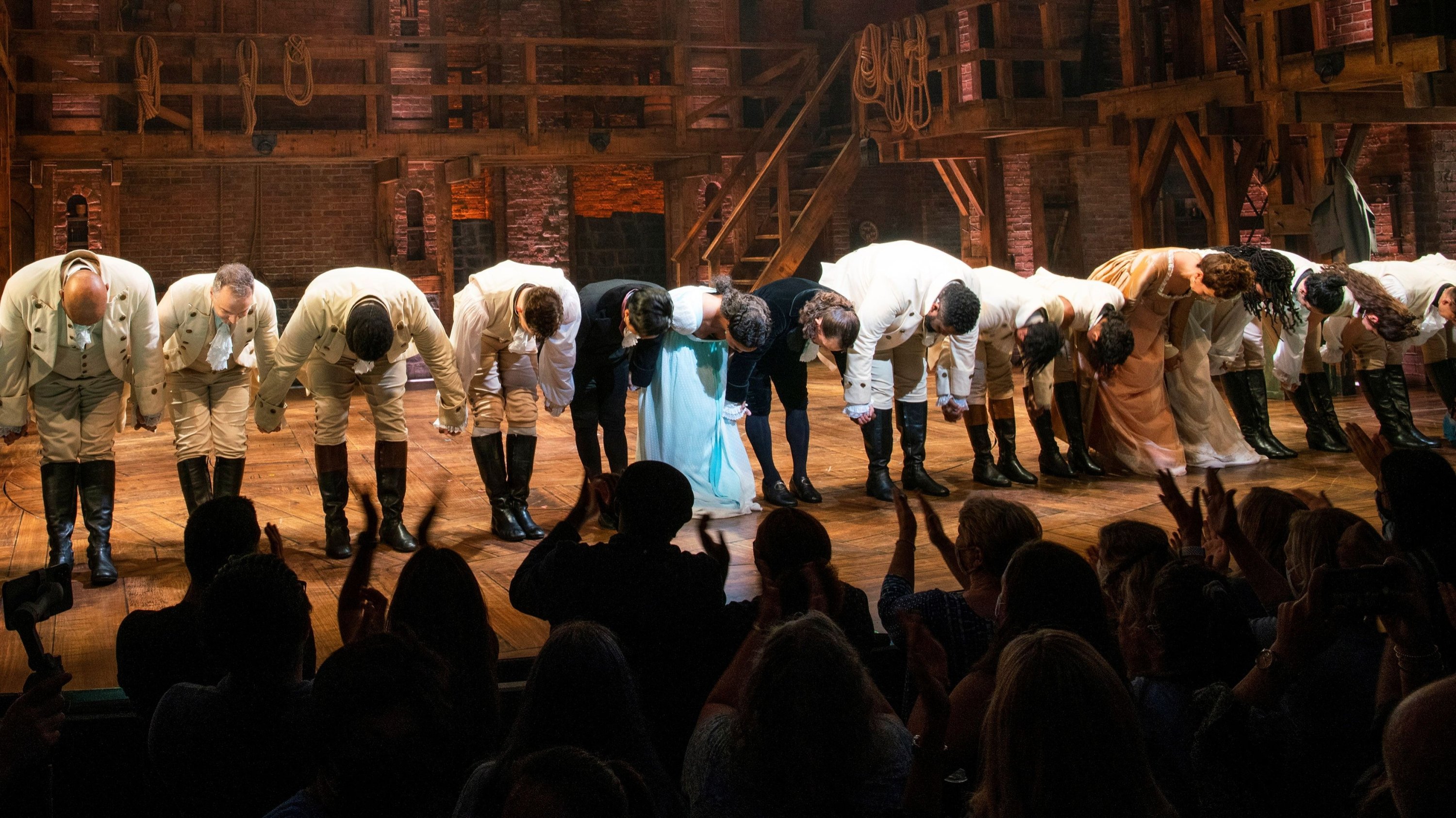 Actors greet the audience at the Richard Rogers theater during curtain call of the first return performance of 'Hamilton' as Broadway shows begin to re-open to live audiences, in Manhattan, New York, U.S., Sept. 14, 2021. (Reuters Photo)