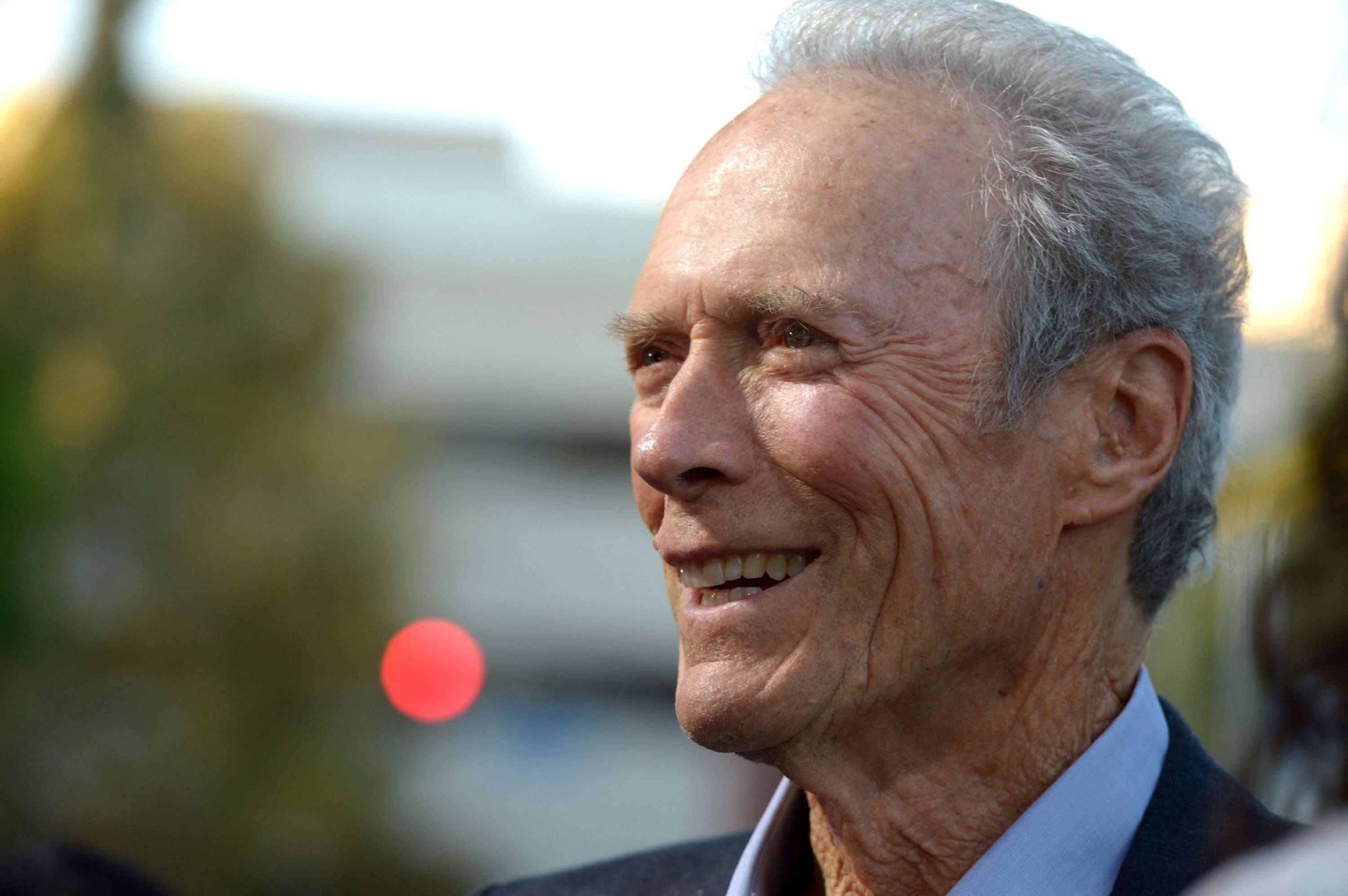 Actor-producer Clint Eastwood arrives at Warner Bros. Pictures' 'Trouble With The Curve' premiere at Regency Village Theatre in Westwood, California, U.S, Sept. 19, 2012. (Photo by KEVIN WINTER / GETTY IMAGES NORTH AMERICA via AFP)